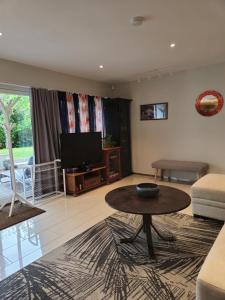 Χώρος καθιστικού στο Familievennlig