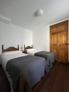 Postel nebo postele na pokoji v ubytování Casa Damián del Baile Casas Rurales