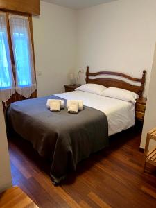 Postel nebo postele na pokoji v ubytování Casa Damián del Baile Casas Rurales + 4 fotografie