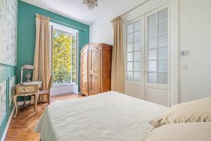 Postel nebo postele na pokoji v ubytování Luxury Notre Dame by BookingGuys