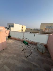 a camera on the roof of a building at Jasmine court penthouse in Tal-Ħriereb