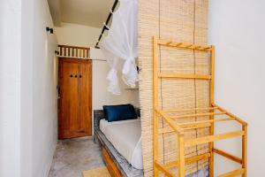 Postel nebo postele na pokoji v ubytování Malkoha Studios