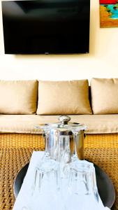 Μια τηλεόραση ή/και κέντρο ψυχαγωγίας στο Lakeview Granada Hotel Boutique