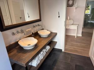 Koupelna v ubytování Wohnen am Waldrand, zentral und ruhig + 12 fotografií