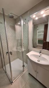 Ένα μπάνιο στο Lavén Superior Apartment +37 φωτογραφίες