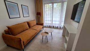 Μια τηλεόραση ή/και κέντρο ψυχαγωγίας στο Lavén Superior Apartment