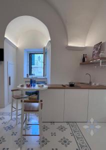 Kuchyň nebo kuchyňský kout v ubytování Freedomus + 24 fotografií