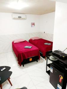 Φωτογραφία από το άλμπουμ του Suite COP30 Cozinha e Ar Condicionado Express Centro σε Μπελέμ