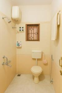 Ένα μπάνιο στο Shanti Niwas Apartment