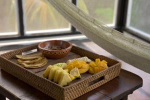 a tray of cheese and crackers on a table at Tekio Beach Hotel in Holbox Island