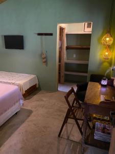 Ένα ή περισσότερα κρεβάτια σε δωμάτιο στο Aldeia Patuá - chalés na Praia de Algodões