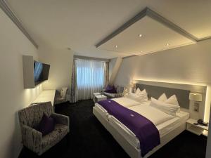 Postel nebo postele na pokoji v ubytování Hotel Krone OHG