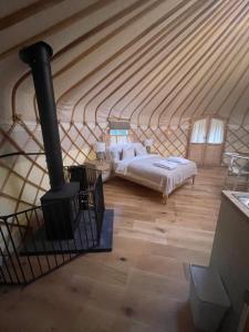 Ένα ή περισσότερα κρεβάτια σε δωμάτιο στο Home Farm Retreat