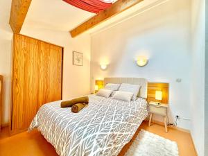 Ένα ή περισσότερα κρεβάτια σε δωμάτιο στο Le Soleil du Mas, 2 pers, Piscine à Calvisson