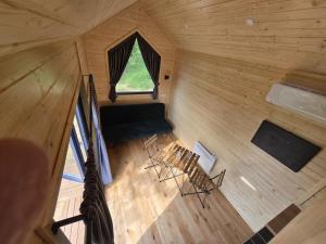 an overhead view of a room in a tiny house at In the Wild Volcano Sea Side 