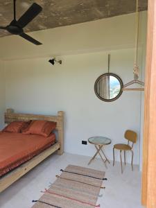 Ένα ή περισσότερα κρεβάτια σε δωμάτιο στο Casba Hostel