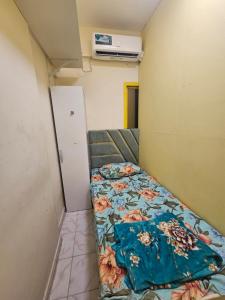 Ένα ή περισσότερα κρεβάτια σε δωμάτιο στο Luxurious partition room bed space