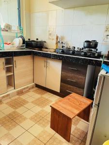 Kuchyň nebo kuchyňský kout v ubytování Coastal Bliss 2BR Beach Getaway in Kanamai, Mtwapa