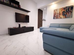 TV a/nebo společenská místnost v ubytování Ta' Palal