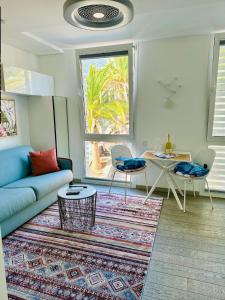 Posezení v ubytování AMBER APARTMENTS - FRESH STUDIO