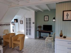 Μια τηλεόραση ή/και κέντρο ψυχαγωγίας στο Les Jardins de Virginie