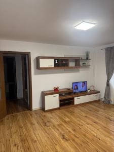 Μια τηλεόραση ή/και κέντρο ψυχαγωγίας στο Apartament 2 camere