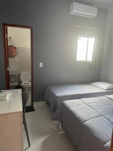 Ένα ή περισσότερα κρεβάτια σε δωμάτιο στο Santa Clara - Hotel