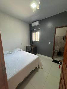 Ένα ή περισσότερα κρεβάτια σε δωμάτιο στο Santa Clara - Hotel