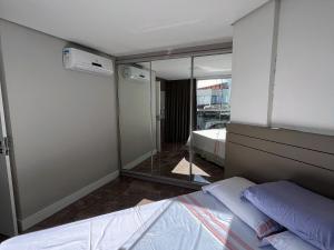 Postel nebo postele na pokoji v ubytování Duplex Pé na Areia - 3 Quartos - Vista para o Mar - Até 08 Pessoas