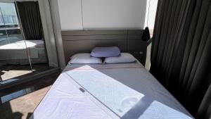 Postel nebo postele na pokoji v ubytování Duplex Pé na Areia - 3 Quartos - Vista para o Mar - Até 08 Pessoas