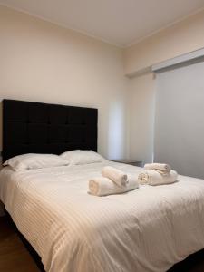 Ένα ή περισσότερα κρεβάτια σε δωμάτιο στο Modern apartment in Lima