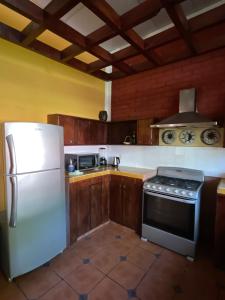 Kuchyň nebo kuchyňský kout v ubytování Casa de Playa en Atami, La Libertad, El Salvador + 14 fotografií