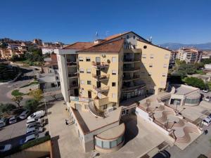 an overhead view of a building in a city at House Le Treemme in Chiubbica