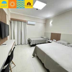 Ένα ή περισσότερα κρεβάτια σε δωμάτιο στο Spazzio com acesso ao Acqua Park - Cn Heloisa +19 φωτογραφίες