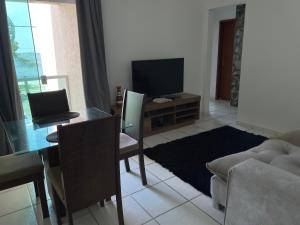 Et tv og/eller underholdning på Casa Céu & Mar