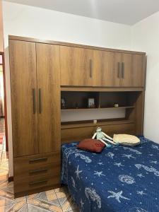 En eller flere senge i et værelse på Casa Dois - Rio das Ostras + 29 billeder