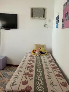 Et tv og/eller underholdning på Casa Dois - Rio das Ostras