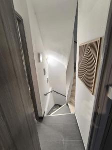 a view of a stairway in a building at L'horizon De Coursan in Coursan