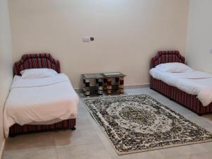 Postel nebo postele na pokoji v ubytování Sunset view hill jabal shams