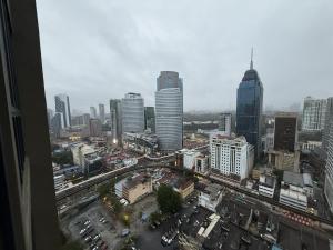 a view of a city with buildings and traffic at Majestic Residance Luxury Suites By klcc in Gua Sai