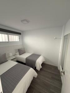 Postel nebo postele na pokoji v ubytování Solarena - 37