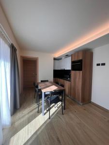 TV a/nebo společenská místnost v ubytování Alpen Chalet Colfè - Myholidaylivigno + 48 fotografií