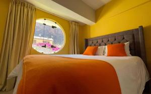 Ένα ή περισσότερα κρεβάτια σε δωμάτιο στο CasaDePaz Samay Wasi