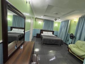 Voodi või voodid majutusasutuse Welcome to Ilé Amor - The House of Love! toas