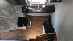 Μια τηλεόραση ή/και κέντρο ψυχαγωγίας στο Chalés Pedras e Madeiras