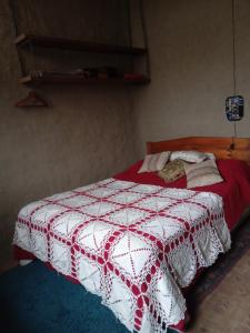 Ένα ή περισσότερα κρεβάτια σε δωμάτιο στο Lodge Malezas del Desierto