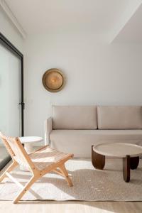 a living room with a couch and a coffee table at Casa Tester by FTV HOLIDAYS HOMES in Villaverde