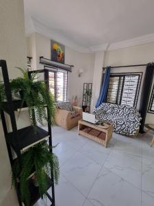 Postel nebo postele na pokoji v ubytování Appartmeublé , Cotonou