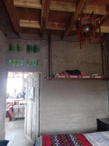 Ένα ή περισσότερα κρεβάτια σε δωμάτιο στο Lodge Malezas del Desierto +1 φωτογραφίες