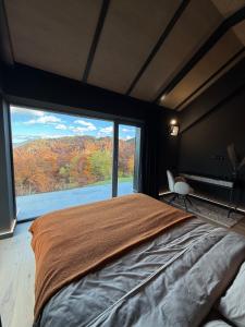 Ένα ή περισσότερα κρεβάτια σε δωμάτιο στο Nordic Star Chalet